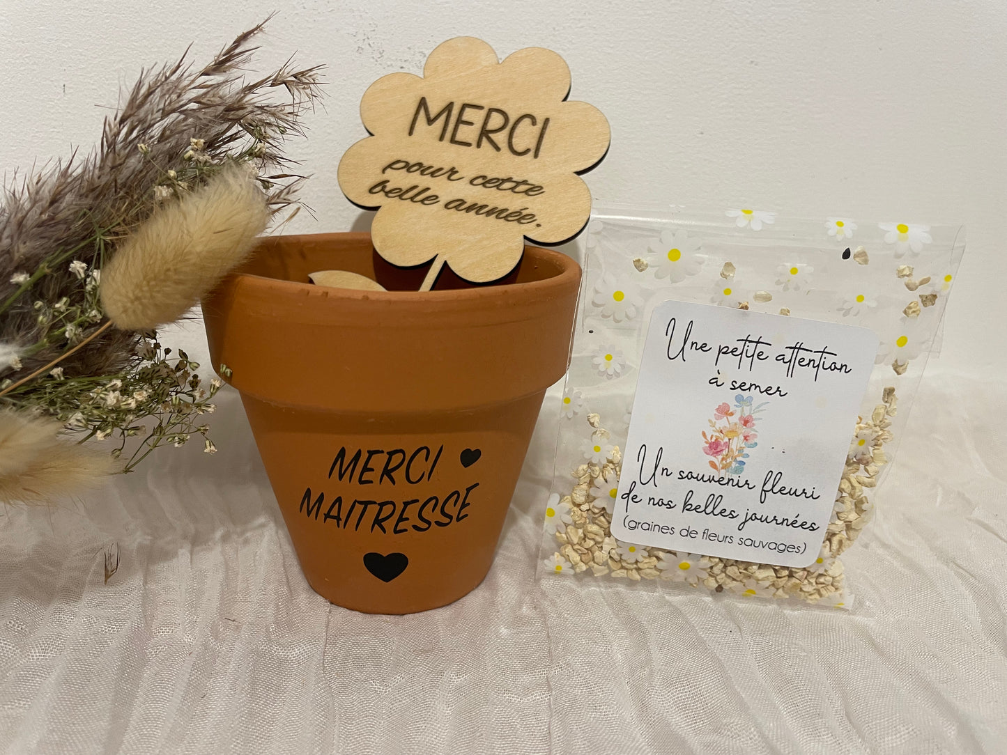 Souvenir fleuri avec son pot